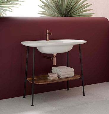 VitrA Plural washbasin unit in matt white against deep red wall